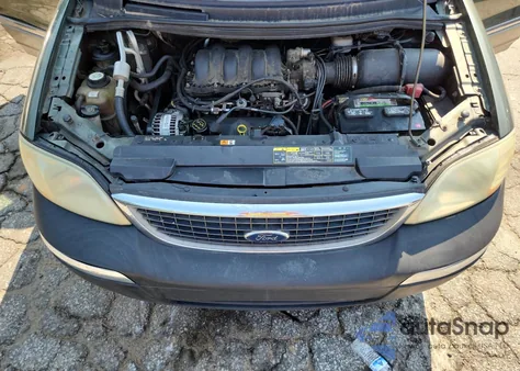 2003 Ford Windstar Limited из США, поврежденный, VIN 2FMDA58483BA42725